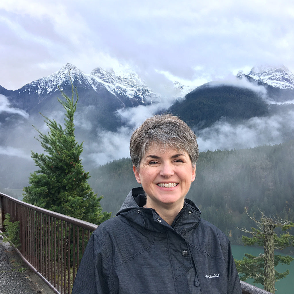 Photo of Monica Hampton in the North Cascades mountains of Washington State